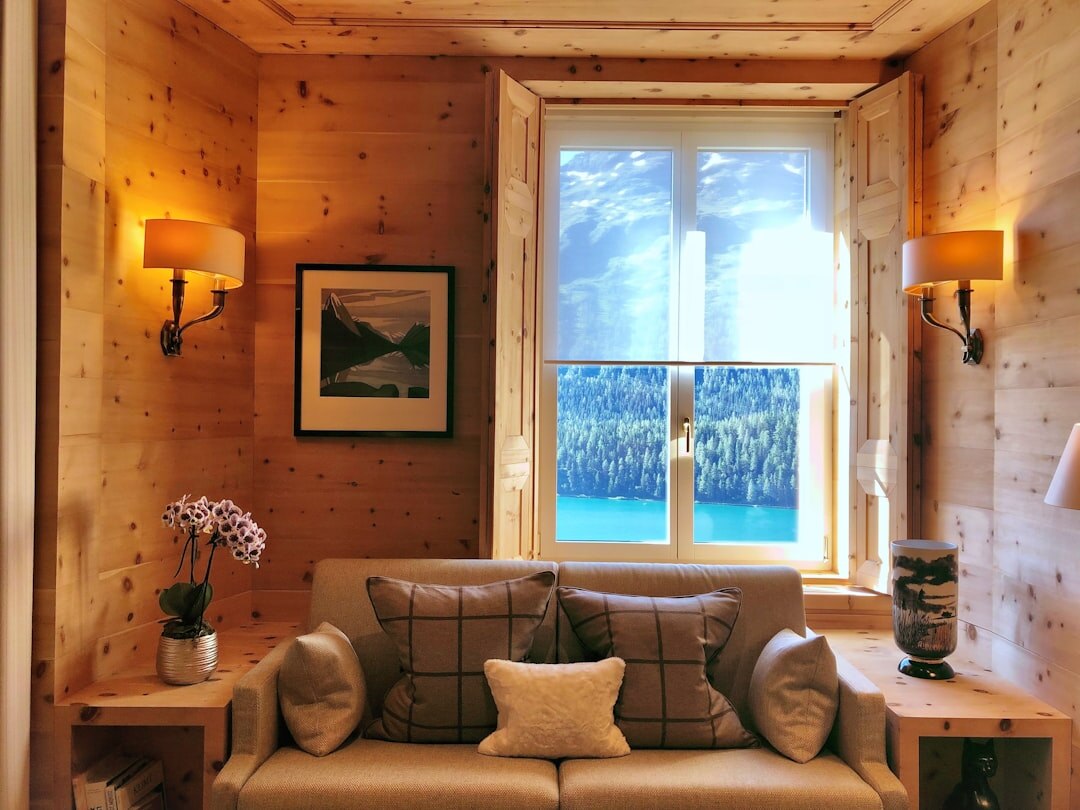 Luxury ski chalet in St. Moritz surrounded by snow